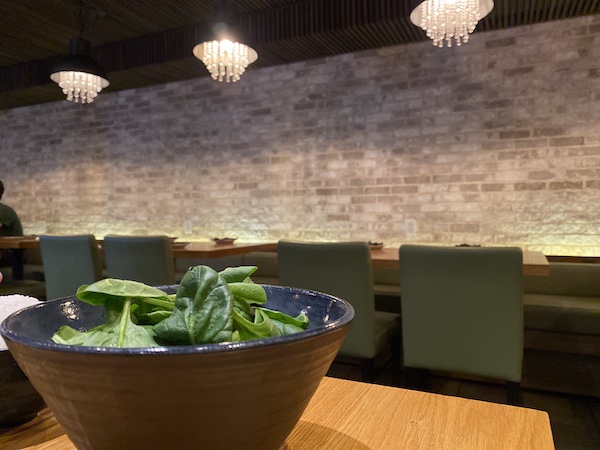 A bowl of ramen in a restaurant. 