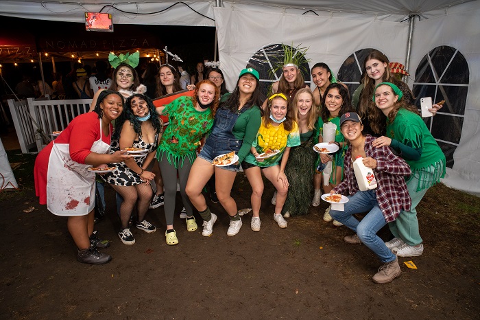 Group of students posing together in various costumes.